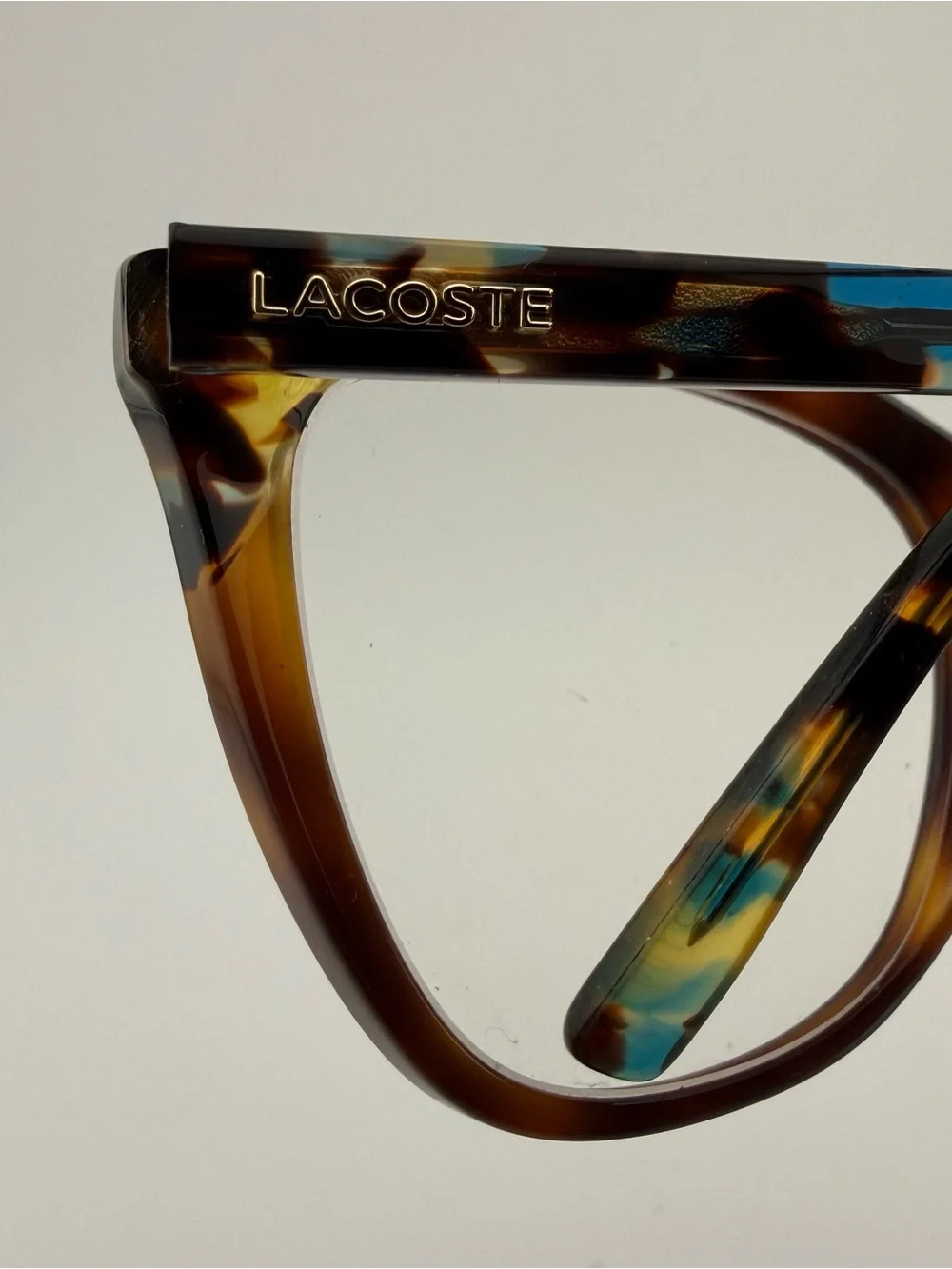 Lacoste Women's Tortoise Round Frame Glasses with Green-Blue Marble Temples